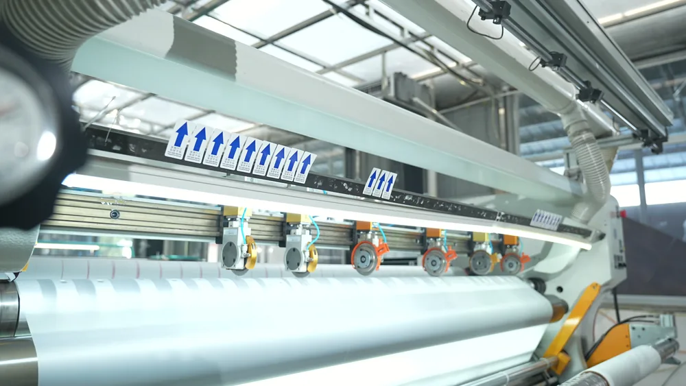 Jinlong DTF Film Manufacturing Process step 08: Slitting